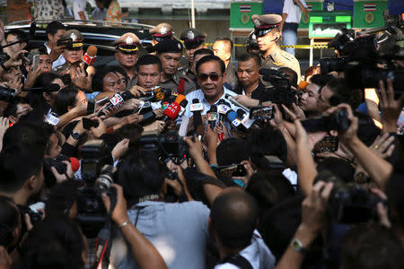 Thailand's Prime Minister Prayuth Chan-ocha speaks to media after voting in the general election at a polling station in Bangkok, Thailand, March 24, 2019. REUTERS/Athit Perawongmetha