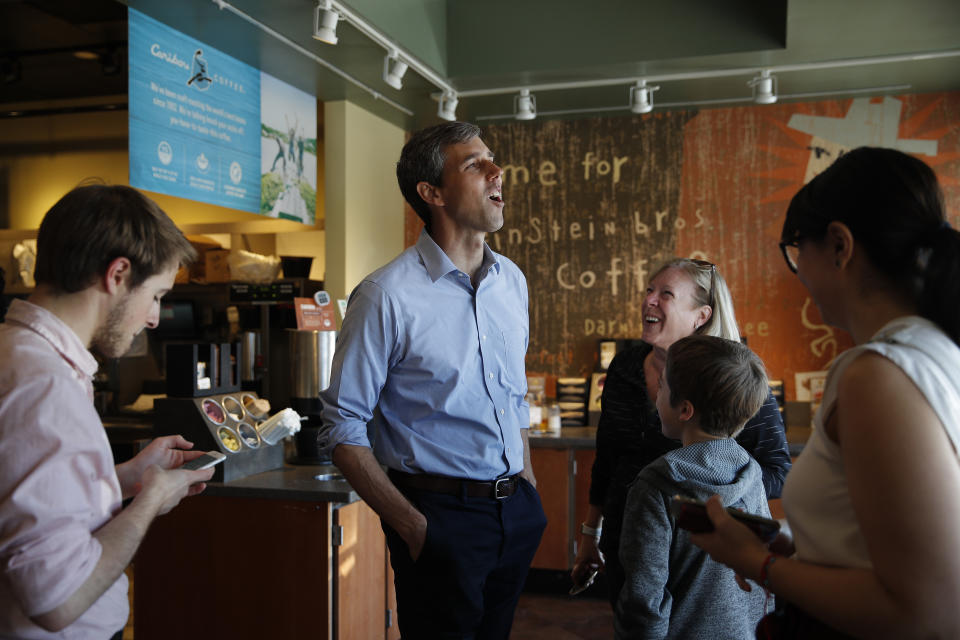 Democratic presidential candidate and former Texas congressman Beto O'Rourke laughs while meeting people at a restaurant Sunday, March 24, 2019, in Las Vegas. (AP Photo/John Locher)