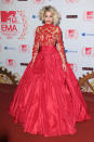 Rita Ora: Somewhere out there, Scarlett O'Hara is missing some curtains. Singer Rita Ora makes sure all eyes are on her in a voluminous fire red lace gown. The detailed lace bits against the sheer fabric is pretty but that skirt needs to be taken down a few layers. (Photo by Mike Marsland/WireImage)