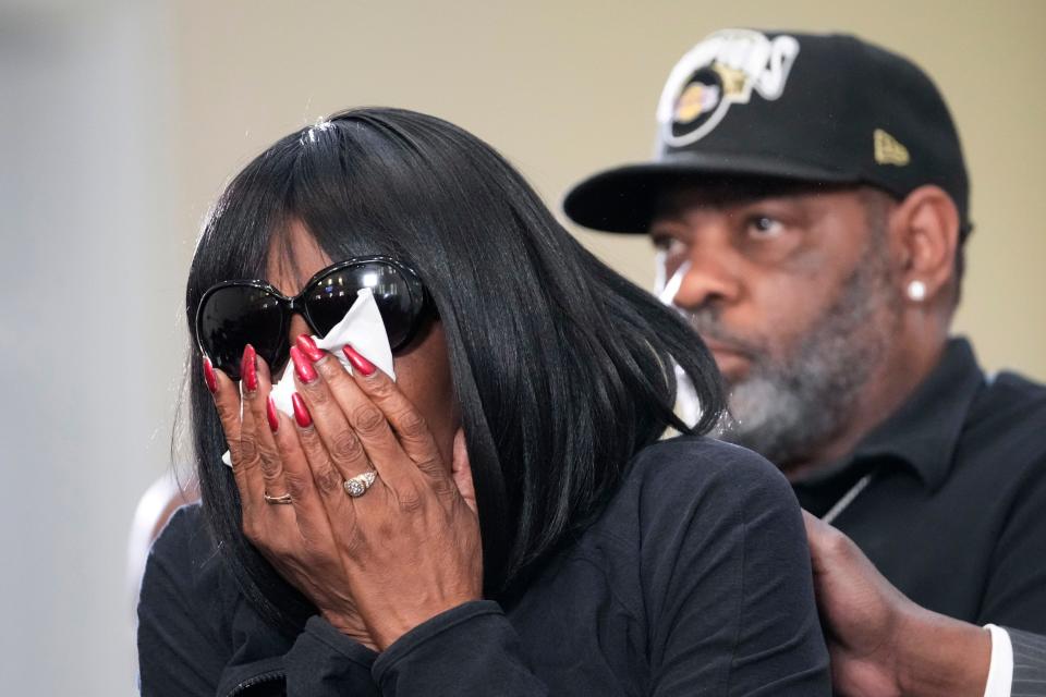 RowVaughn Wells, mother of Tyre Nichols, who died after being beaten by Memphis police officers, cries as she is comforted by Tyre's stepfather Rodney Wells, at a news conference with civil rights Attorney Ben Crump in Memphis, Tenn., Monday, Jan. 23, 2023.