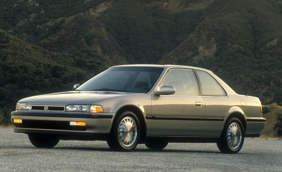 <p>The Honda Accord grows to mid-size stature with the arrival of its fourth generation for 1990 and enjoys a sales surge, surpassing 400,000 units and opening up a better than 100,000-unit lead over the second-place Ford Taurus. Again, <a rel="nofollow noopener" href="https://www.caranddriver.com/features/1990-10best-cars-1990-honda-accord-page-5" target="_blank" data-ylk="slk:it’s named to our 10Best Cars list;elm:context_link;itc:0;sec:content-canvas" class="link ">it’s named to our 10Best Cars list</a>.</p>