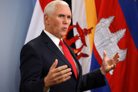 U.S. Vice President Mike Pence speaks during a news conference in Singapore, November 15, 2018. REUTERS/Athit Perawongmetha