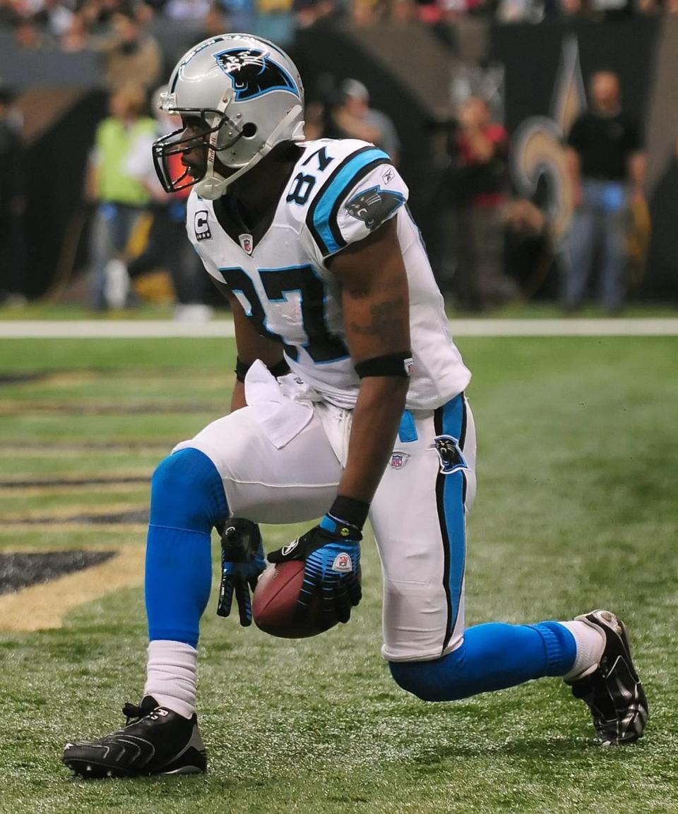 Carolina Panthers (87) wide receiver Muhsin Muhammad celebrates his touchdown pass reception from quarterback (17) Jake Delhomme during second-quarter action vs the New Orleans Saints Sunday at the Louisiana Superdome in a 2008 game.