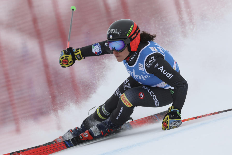 Italy's Federica Brignone speeds down the course during an alpine ski, women's World Cup giant slalom, in Kronplatz, Italy, Tuesday, Jan. 24, 2023. (AP Photo/Alessandro Trovati)