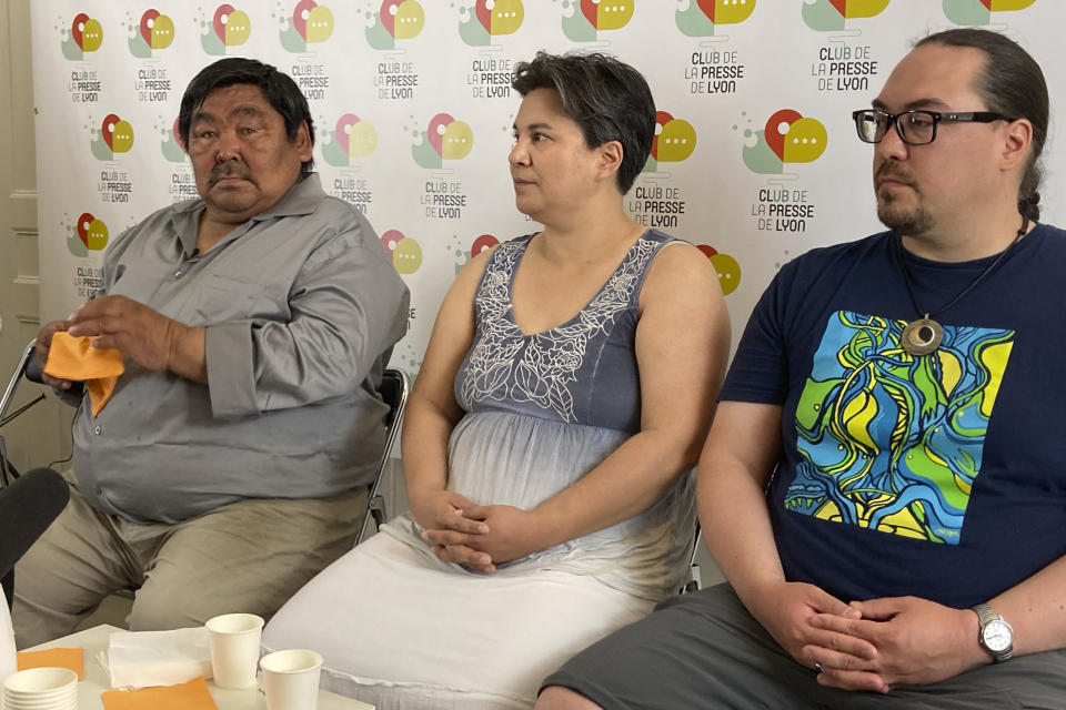 From the left, Inuit delegation members Jesse Tungilik , Tanya Tungilik and Steve Mapsalak attend a press conference in Lyon, central France, Thursday, Sept.15, 2022. A priest accused of sexually abusing dozens of Inuit children when he missioned in their Canadian Arctic community has told alleged victims and relatives who traveled to France to confront him that he won't go back to Canada to be questioned. (AP Photo/Nicolas Vaux-Montagny)