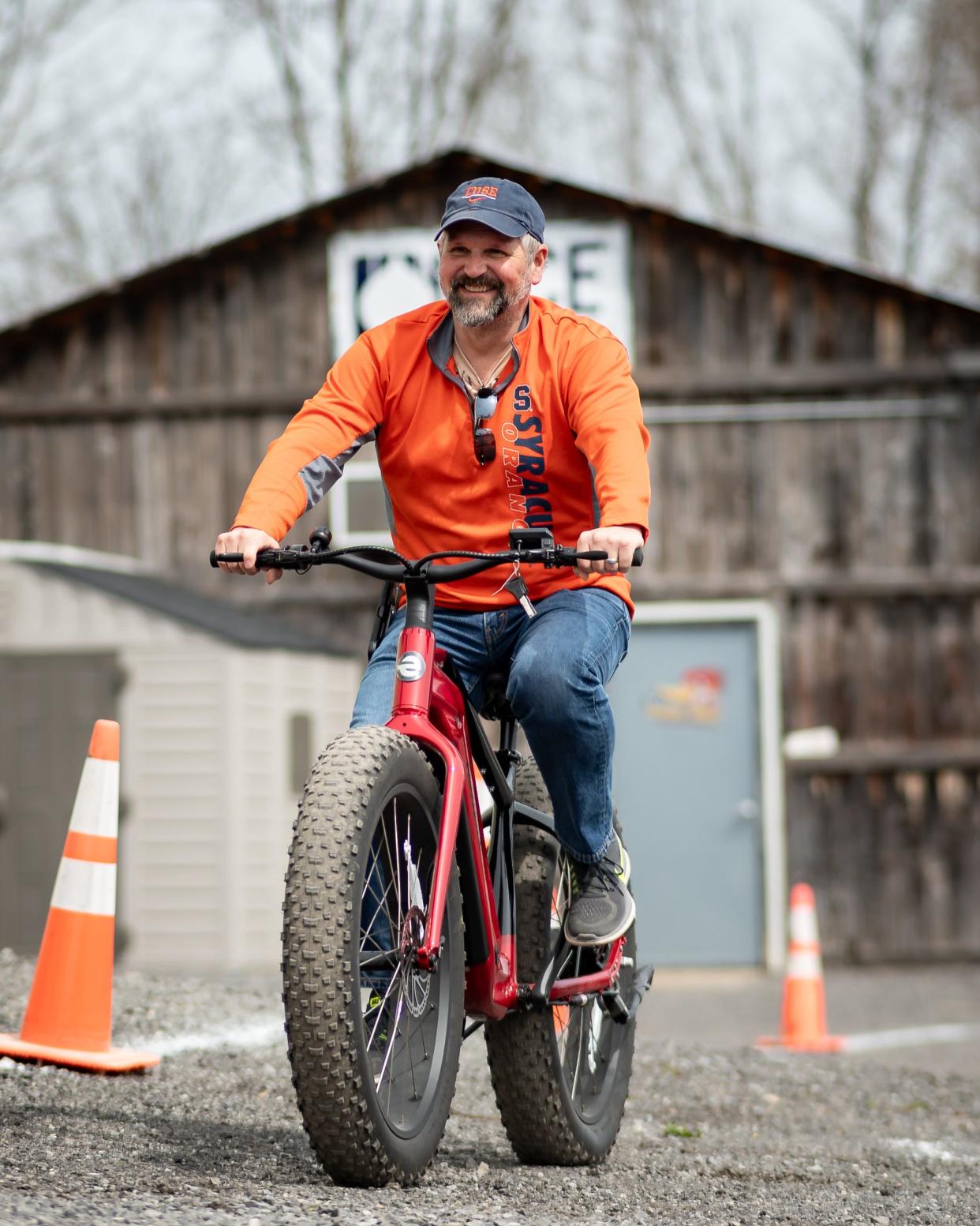 Adam Spooner test drives an electric bicycle at the new eBliss Experience Center in Clinton, NY on Saturday, April 27, 2024.