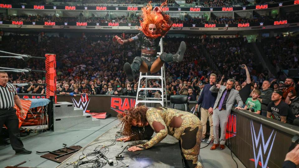 Becky Lynch drops a leg on foe Nia Jax in a last woman standing match on "Monday Night Raw."