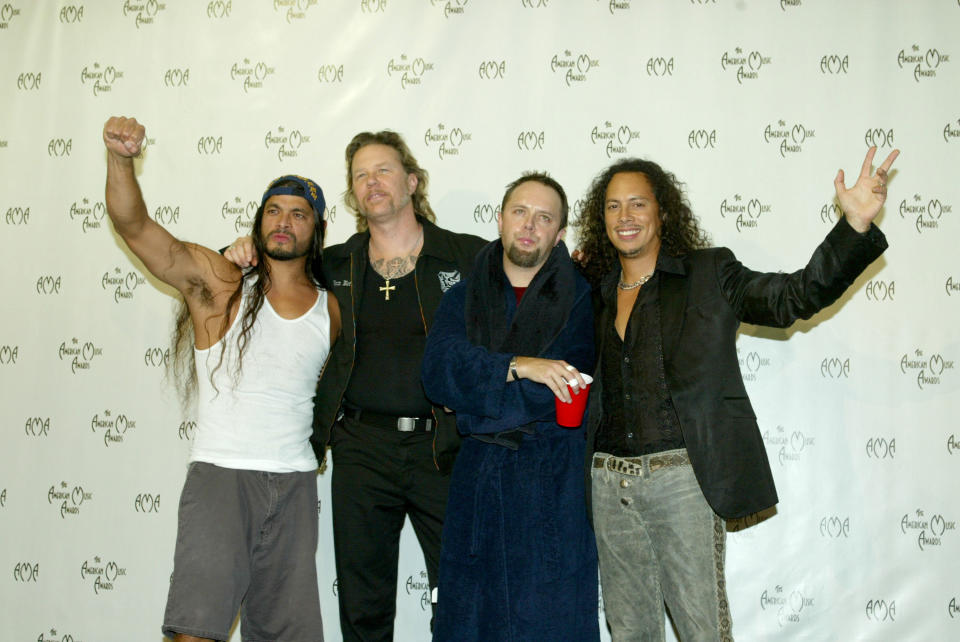 LOS ANGELES - NOVEMBER 16:   (L-R) Rob Trujillo, James Hetfield, Lars Ulrich and Kirk Hammett of Metallica pose backstage at the 31st Annual American Music Awards at The Shrine Auditorium November 16, 2003 in Los Angeles, California.  (Photo by Kevin Winter/Getty Images)