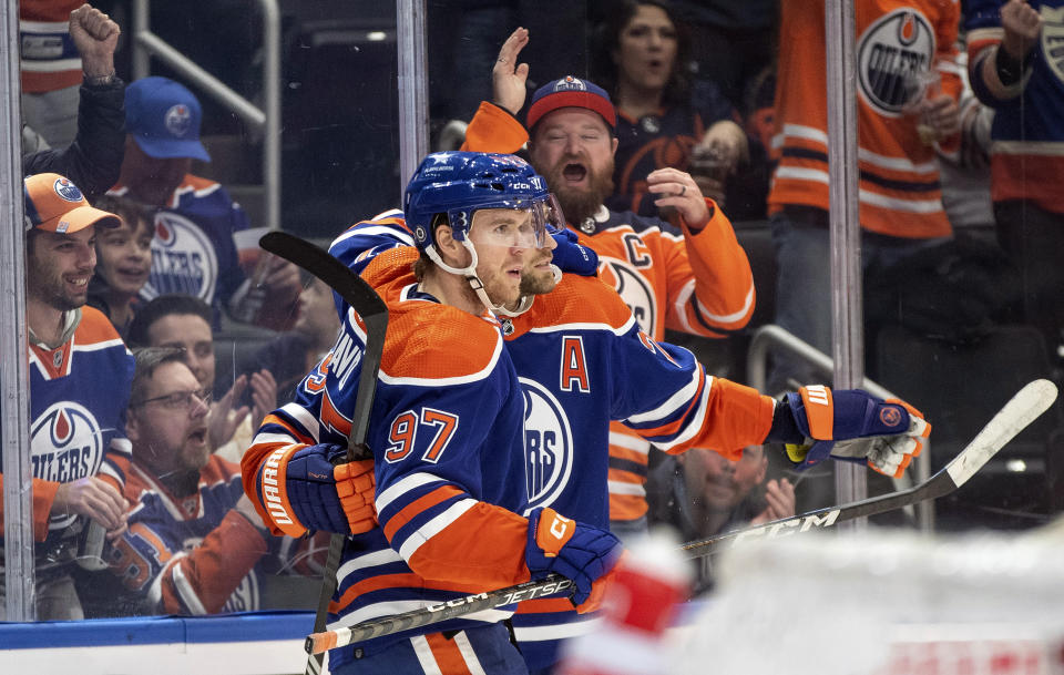 Edmonton Oilers' Connor McDavid (97) celebrates a goal against the Seattle Kraken during the second period of an NHL hockey game, Wednesday, Nov. 15, 2023 in Edmonton, Alberta. (Jason Franson/The Canadian Press via AP)