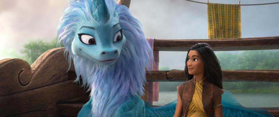 Animation: a Southeast Asian girl smiles at a blue and purple dragon. The dragon smiles back.