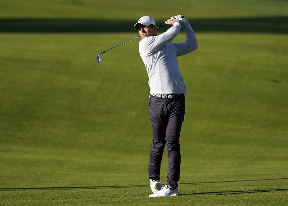 Rory McIlroy, of Northern Ireland, hits his second shot on the seventh hole during the Genesis Invitational pro-am golf event at Riviera Country Club, Wednesday, Feb. 12, 2020, in the Pacific Palisades area of Los Angeles. (AP Photo/Ryan Kang)