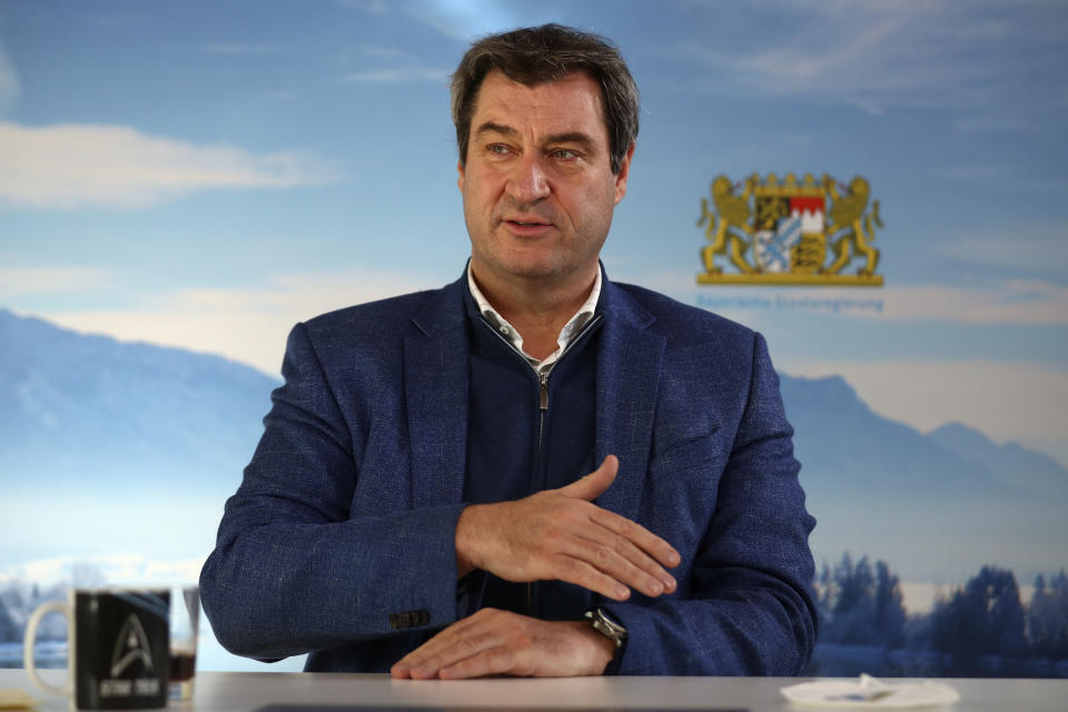Bavarian state governor Markus Soeder attends an Associated Press interview in Nuremberg, Germany, Thursday, Feb. 18, 2021. Markus Soeder is many things: state governor of Bavaria, Star Trek fan, a conservative for whom combating climate change is an article of faith. The question Germans are asking now is: can the 54-year-old win enough backing across the political spectrum to succeed Angela Merkel as chancellor in September. (AP Photo/Matthias Schrader)
