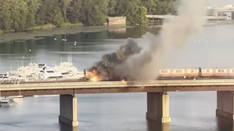 ‘It engulfed very quickly’: Video shows burning Orange Line train on bridge over Mystic River