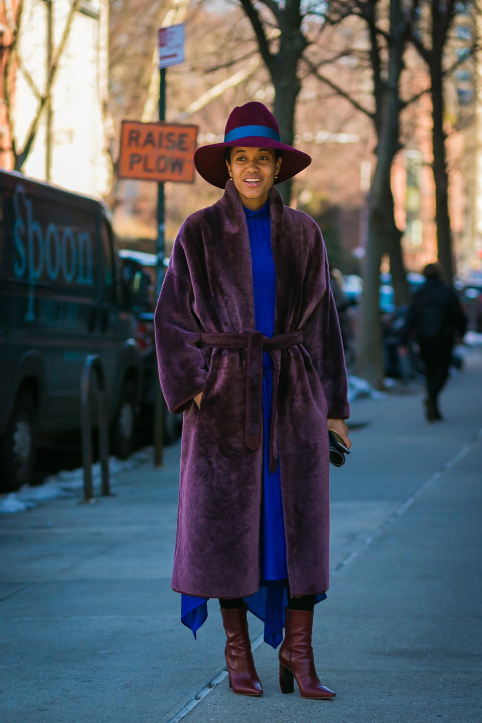 Tamu McPherson wears a rich purple and cobalt blue outfit at New York Fashion Week.