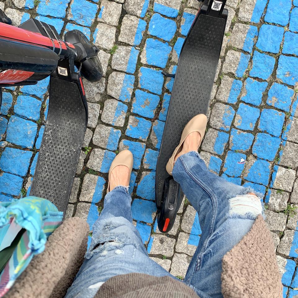 wearing my Amazon Essentials ballet flats while getting ready to scooter (Katie Jackson / TODAY)