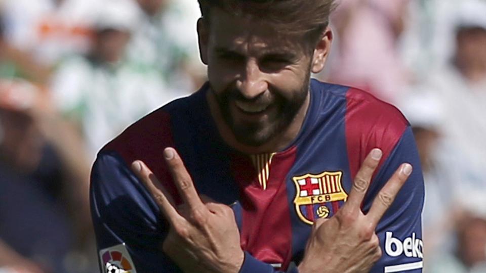 Barcelona's Gerard Pique celebrates after scoring 