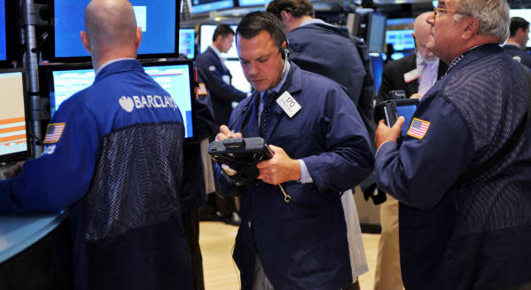 new york stock exchange traders investing earnings wall street facebook