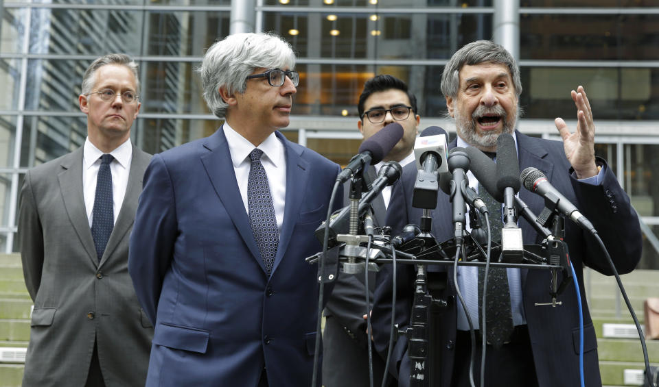 FILE - In this March 8, 2017 file photo, Mark Rosenbaum, right, an attorney for Daniel Ramirez Medina, talks to reporters outside the federal courthouse in Seattle, as fellow attorneys, from left, Ethan Dettmer, Theodore Boutrous Jr., and Luis Cortes, look on. On Friday, March 24 2017, a federal judge upheld a decision not to release Ramirez, a Mexican man who was arrested near Seattle, despite his participation in a program designed to protect those brought to the U.S. illegally as children, saying Ramirez should challenge his detention in immigration court. (AP Photo/Ted S. Warren, file)