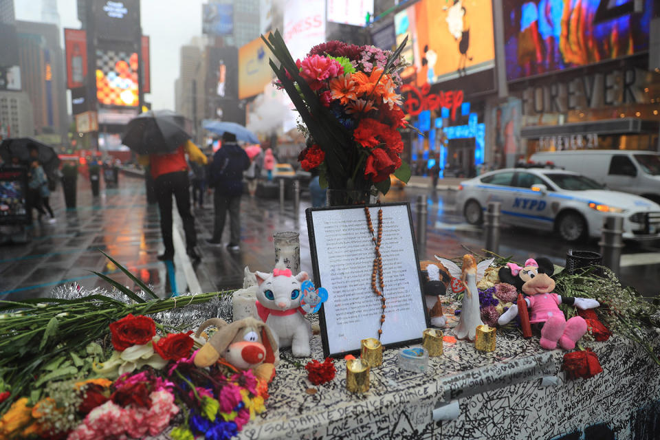 <p>A letter written by Thomas Elsman’s 18-year-old daughter, Alyssa, who was killed Thursday, May 18, sits on top of a temporary memorial near the site where a speeding car plowed into crowds of people in Times Square, New York City, on May 22, 2017. (Photo: Gordon Donovan/Yahoo News) </p>