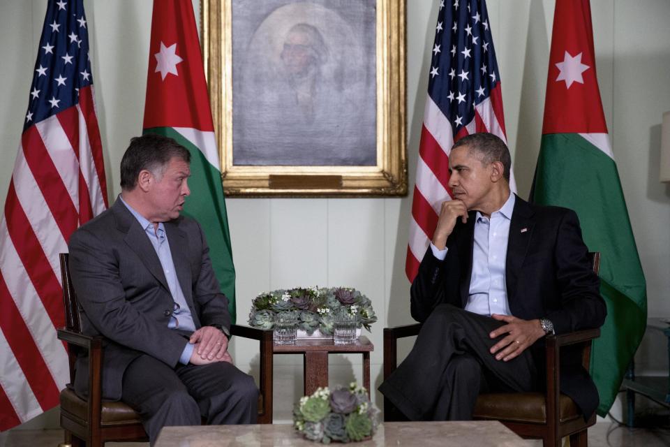 President Barack Obama, right, meets with Jordan's King Abdullah II at The Annenberg Retreat at Sunnylands, Rancho Mirage, Calif., Friday, Feb. 14, 2014. (AP Photo/Jacquelyn Martin)