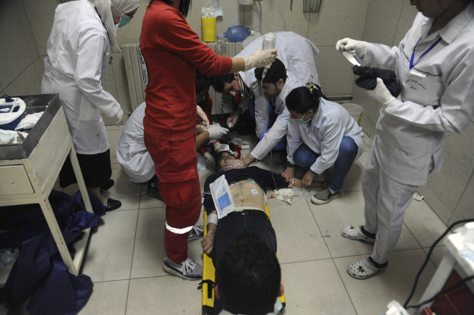 <p>In this photo released by the Syrian official news agency SANA, shows a man receiving treatment at a hospital in Damascus, Syria, Saturday, April. 7, 2018. (Photo: SANA via AP) </p>