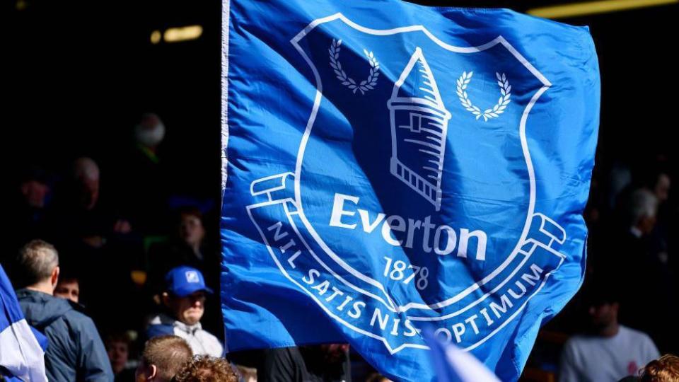 Everton supporters with a flag at Goodison Park
