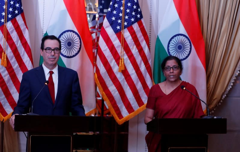 India's Finance Minister Nirmala Sitharaman speaks as U.S. Treasury Secretary Steven Mnuchin watches during a joint news conference in New Delhi