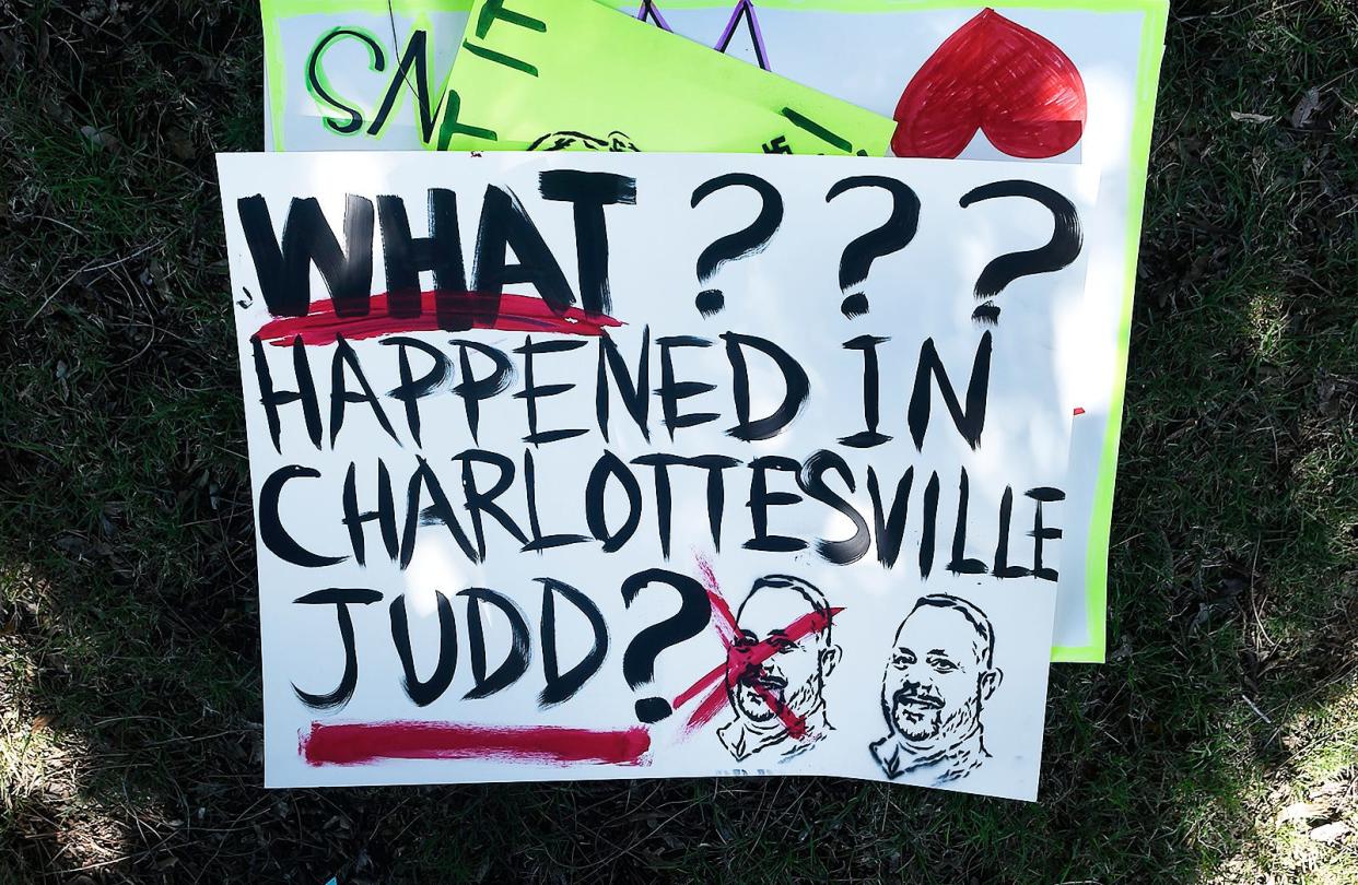 Some of the signs used by members of the Enid Social Justice Committee during a protest of the swearing-in of Judd Blevins to the Enid City Council.