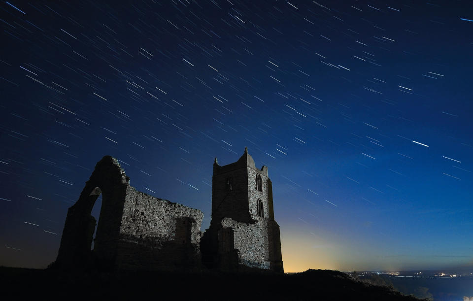 Long exposure of star trails wheeling over a clear night sky above a derelict rural church, taken on October 27, 2011 