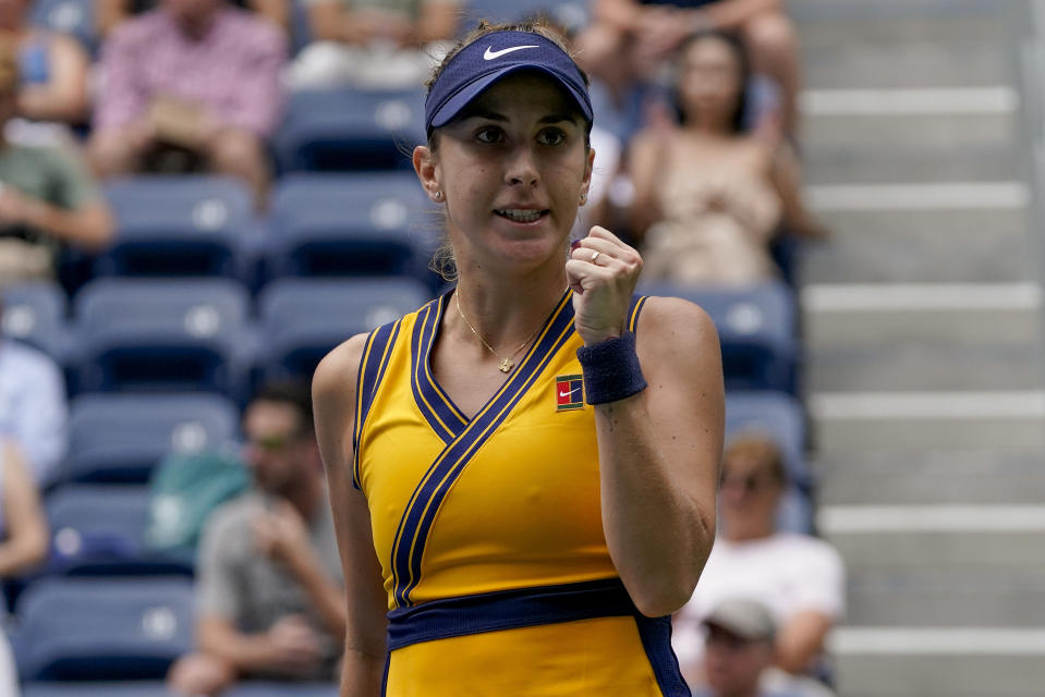 Belinda Bencic, of Switzerland, reacts after beating Arantxa Rus, of the Netherlands, during the first round of the US Open tennis championships, Tuesday, Aug. 31, 2021, in New York. (AP Photo/John Minchillo)