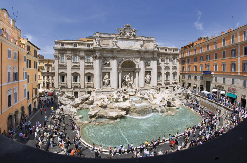 A crowd gathered around Rome's Trevi Fountain