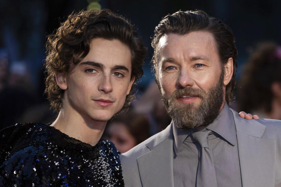 FILE - This Oct. 3, 2019 file photo shows Timothee Chalamet, left, and Joel Edgerton at the premiere of the "The King" during the London Film Festival, in central London. Chalamet portrays King Henry V in the period drama in theaters this week. (Photo by Vianney Le Caer/Invision/AP, File)