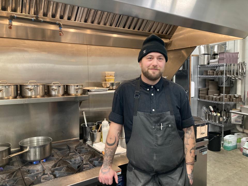 Micah Tavelli, executive chef at Paradiso Hi-Fi Lounge, stands in the kitchen of the Burlington business Jan. 26, 2023.