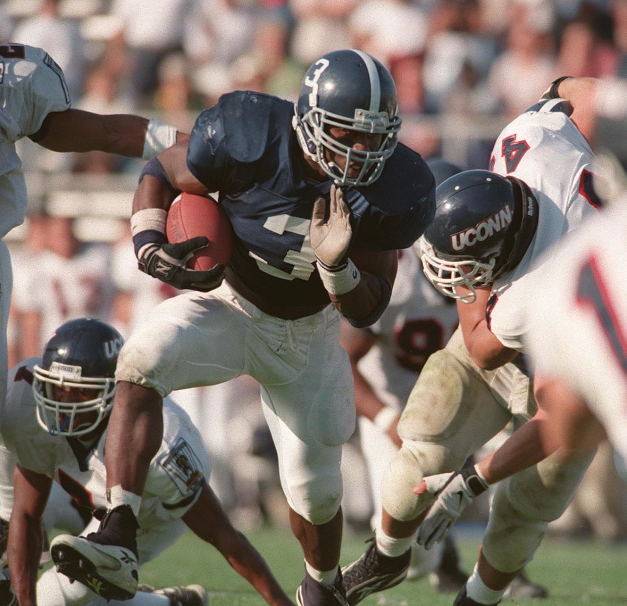 Georgia Southern's Adrian Peterson (3) finds a hole in the UConn defense as he rushes downfield during the NCAA 1-AA (now FCS) quarterfinal playoffs at Paulson Stadium. [JOHN CARRINGTON/SAVANNAH MORNING NEWS FILE PHOTO]