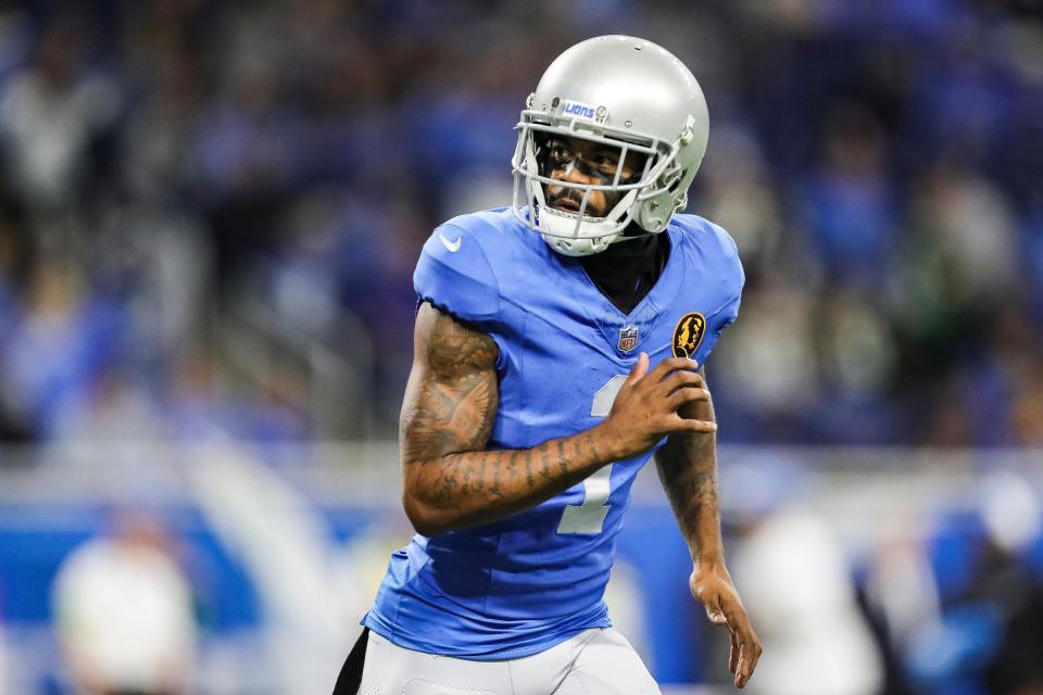 Detroit Lions cornerback Cam Sutton warms up before the game against the Green Bay Packers at Ford Field in Detroit on Thursday, Nov. 23, 2023.