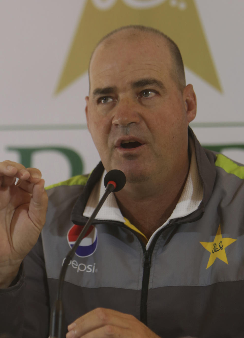 Pakistan cricket team coach Mickey Arthur addresses a news conference in Lahore, Pakistan, Friday, Feb. 8, 2019. Arthur says it's time to move on from captain Sarfraz Ahmed's four-match ban for a racial taunt and concentrate on finalizing the team for the Cricket World Cup. (AP Photo/K.M. Chaudary)