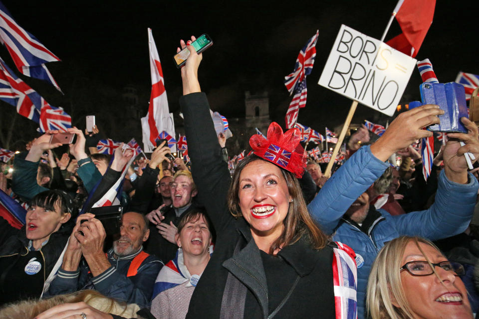 Pro-Brexit supporters celebrate in Parliament Square, London, after the UK left the European Union on Friday, ending 47 years of close and sometimes uncomfortable ties to Brussels.