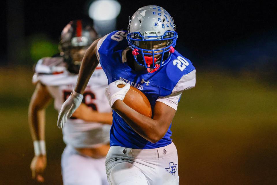 Estacado’s Bobby Ross (20) runs the ball during the team’s high school football game against Levelland Thursday, Oct. 28, 2021 at Lowrey Field at PlainsCapital Park in Lubbock, Texas.