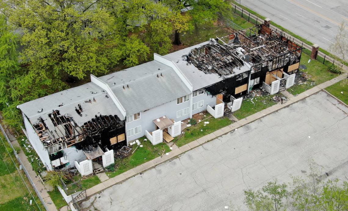 A section of townhomes in Parade Park Homes, a 510-unit community in the 18th and Vine neighborhood, sits burned out and surrounded by debris after fires broke out and the building remains standing. The latest fire in the building occurred in mid-February.