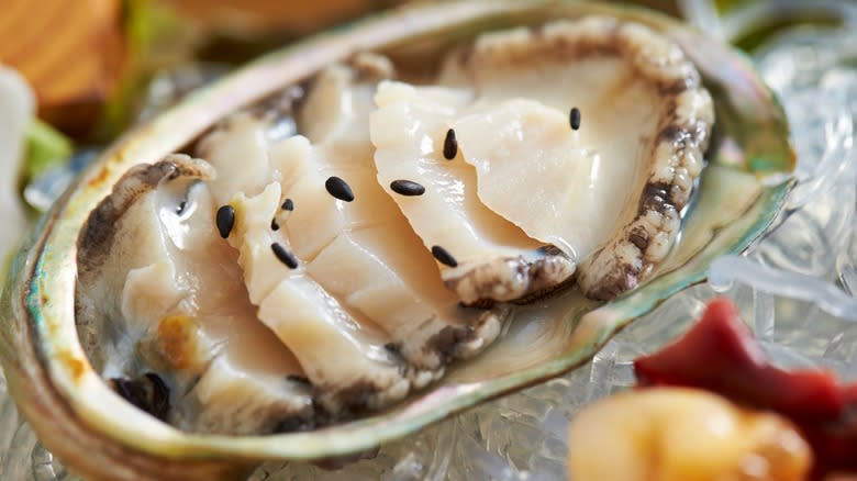 Sliced raw abalone in shell