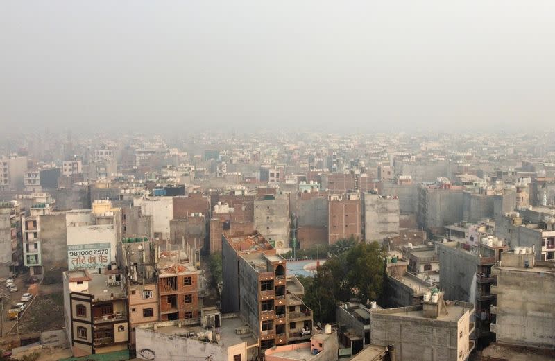 A residential area is seen shrouded in smog in New Delhi