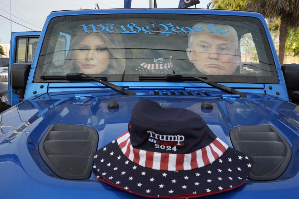 A car belonging to a supporters of former President Donald Trump is shown near the federal court before his arrival, Thursday, March 14, 2024, in Fort Pierce, Fla. (AP Photo/Wilfredo Lee)