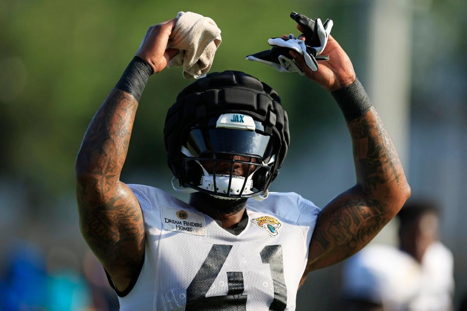 Jacksonville Jaguars linebacker Josh Allen (41) pumps up the crowd Tuesday, Aug. 1, 2023 at Miller Electric Center at EverBank Stadium in Jacksonville, Fla. Today marked the first padded practice. 