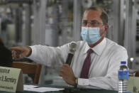 U.S. Health and Human Services Secretary Alex Azar delivers a speech after visiting a mask factory in New Taipei City, Taiwan, Wednesday, Aug. 12, 2020. Wednesday is the last day of Azar's schedule during the highest-level visit by an American Cabinet official since the break in formal diplomatic ties between Washington and Taipei in 1979. (AP Photo/Chiang Ying-ying)