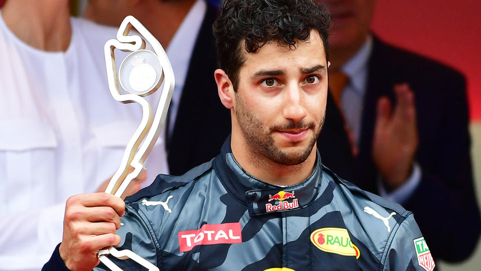 Daniel Ricciardo is pictured holding the second place trophy at the 2016 Monaco Grand Prix.