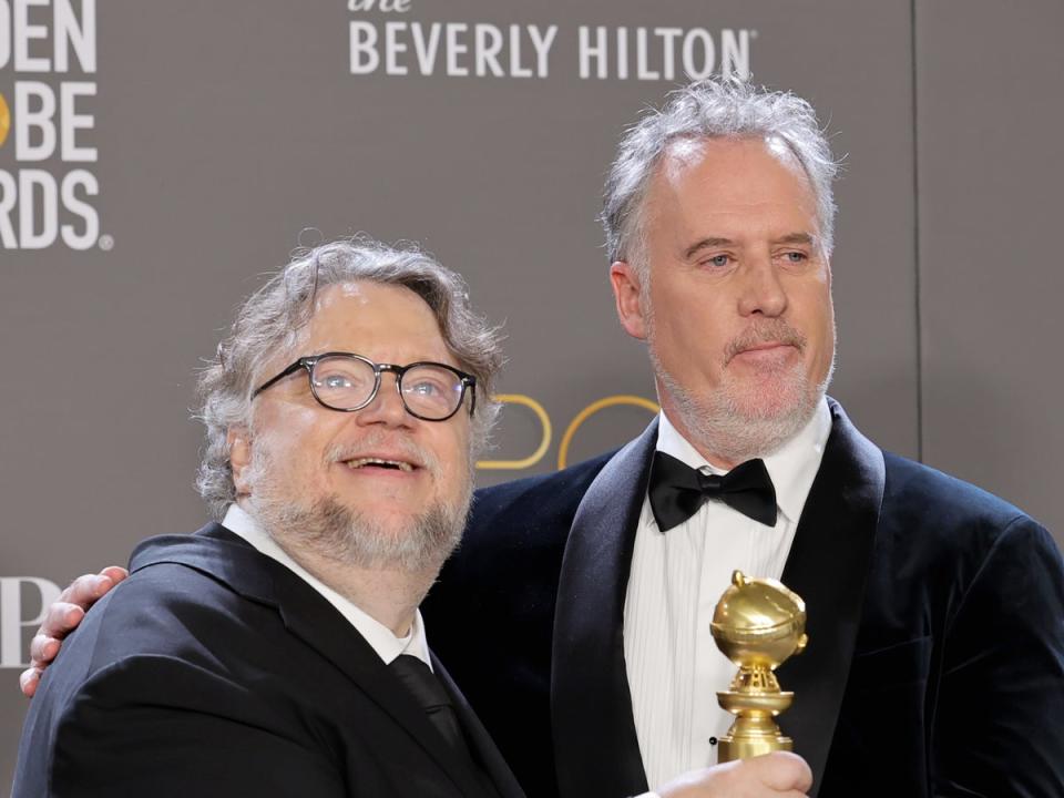 Guillermo del Toro and Mark Gustafson at the Golden Globes (Getty Images)