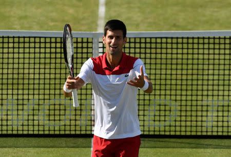 Tennis - ATP 500 - Fever-Tree Championships - The Queen's Club, London, Britain - June 21, 2018 Serbia's Novak Djokovic celebrates after winning his second round match against Bulgaria's Grigor Dimitrov Action Images via Reuters/Tony O'Brien