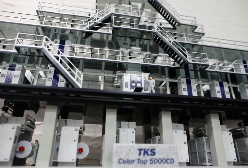 A miniature model of Tokyo Kikai Seisakusho Ltd.'s Color Top 5000CD newspaper rotary press is displayed at the company headquarters office in Tokyo