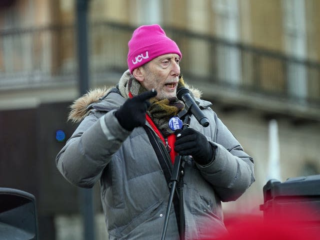 Poet Michael Rosen speaks during a protest outside Downing Street 