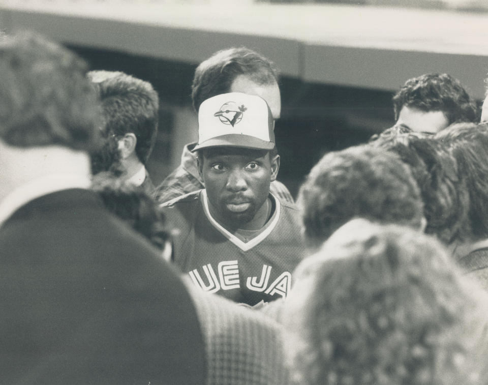 October 6, 1989: Blue Jays outfielder Mookie Wilson has a terrified look as he's surrounded by reporters at the SkyDome before the Jays took on the Oakland A's in Game 3 of the American League Championship Series. (Photo by Tony Bock/Toronto Star via Getty Images)